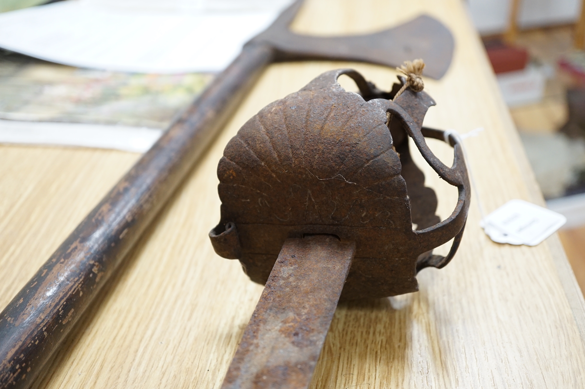 An early pike, a basket hilt sword and a French bayonet. longest 193cm